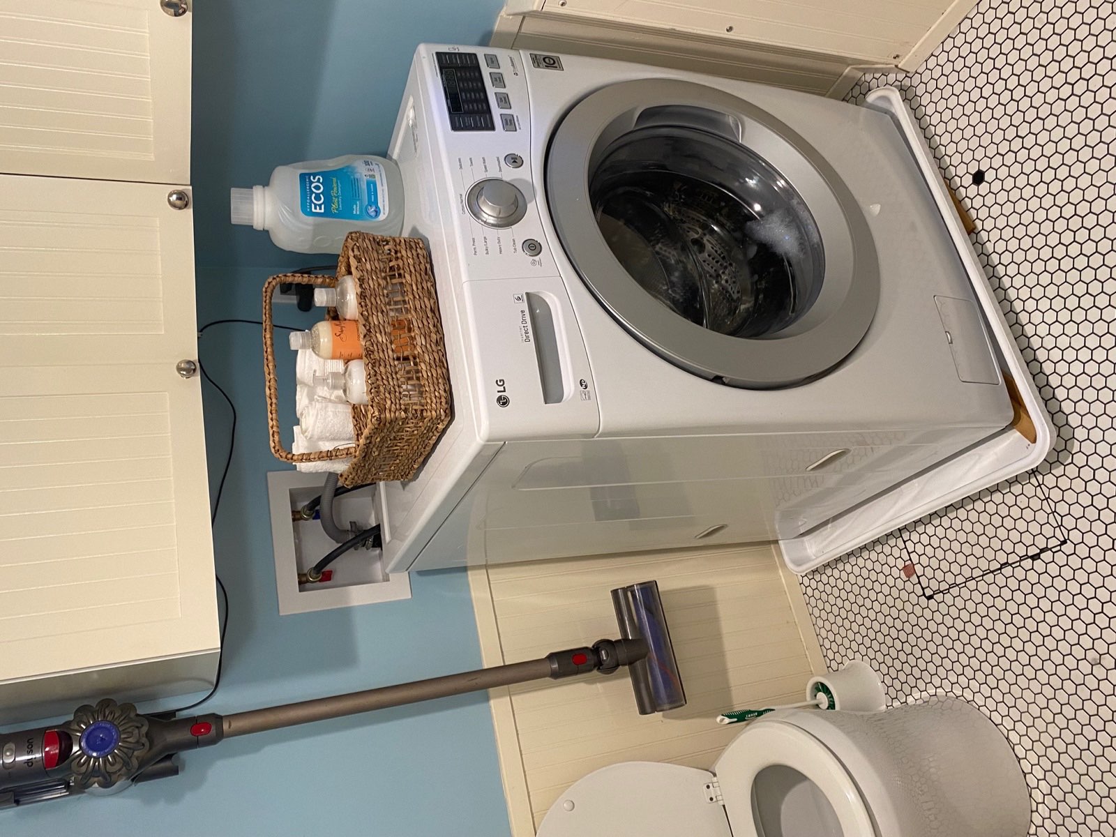 Bathroom with washer and dryer